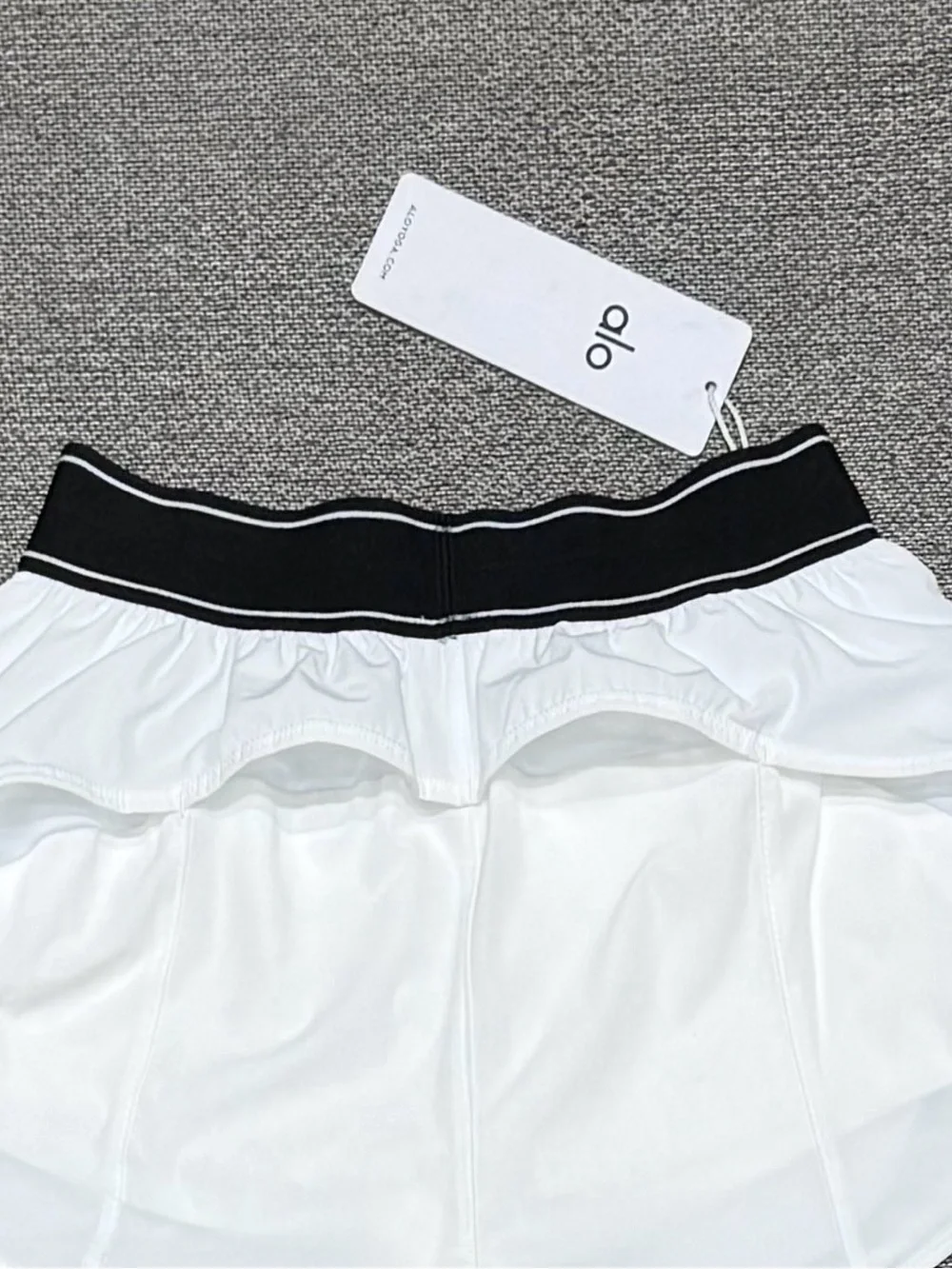 ALO Yoga White Athletic Shorts with Black Branded Waistband